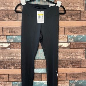 Nike Women's Running Leggings. Mid-rise, 7/8, tight fit. Black. Size small. NWT